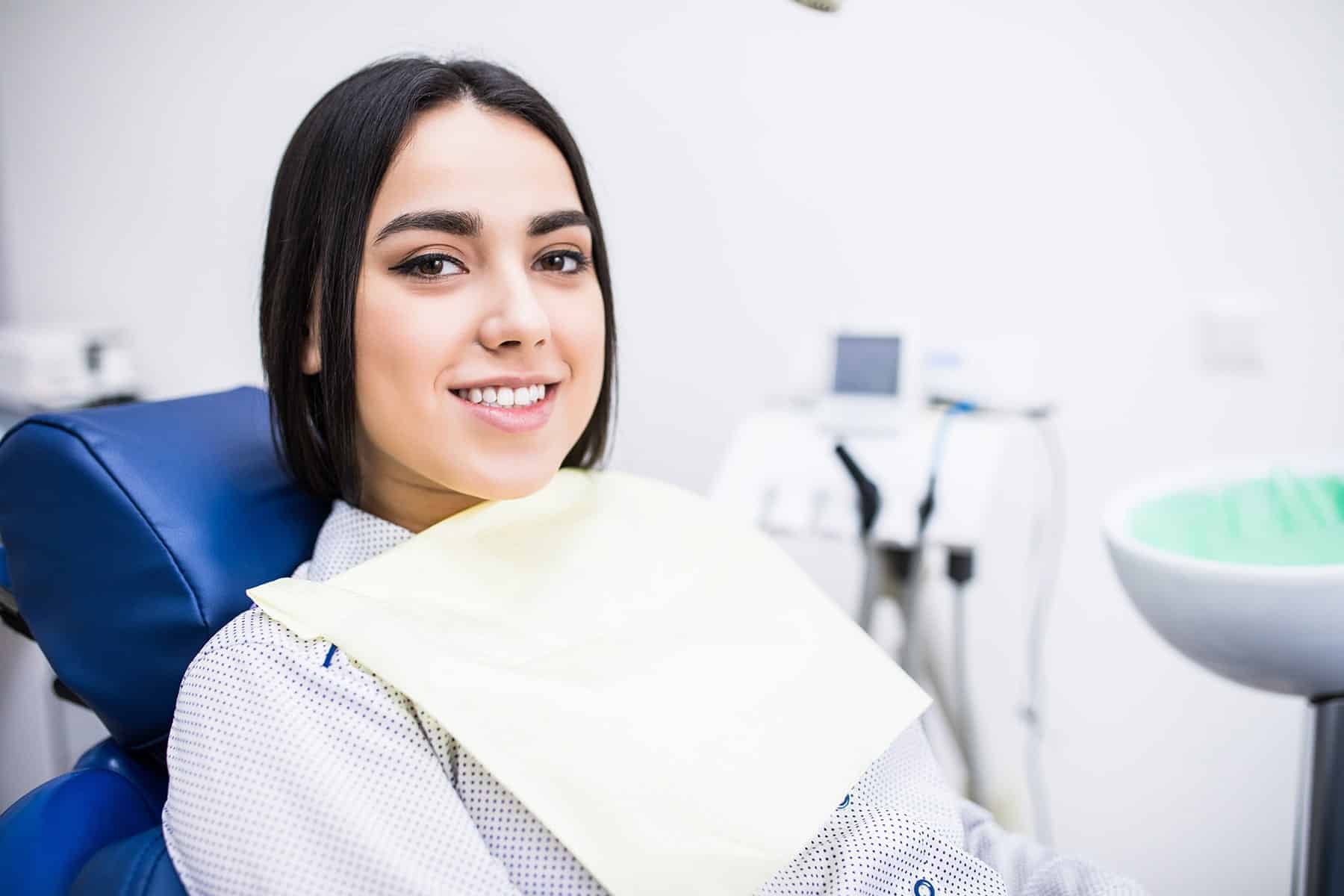 Woman at post root canal appointment in Pooler, GA